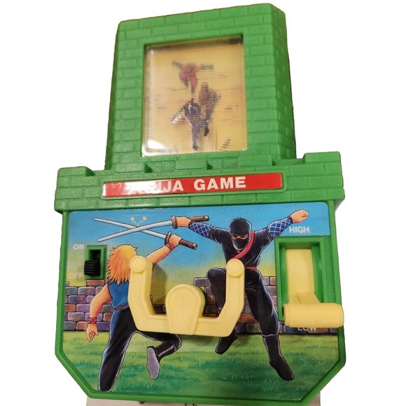 Vintage 1990 Soma Scrolling Vibrating Lit Handheld Ninja Game Tiger Nintendo LCD